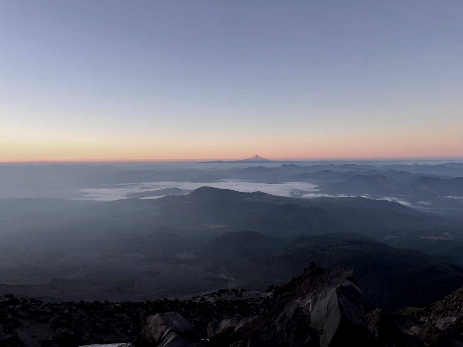 Mt. Hood seen from Mt. St. Helens at dawn, above the clouds