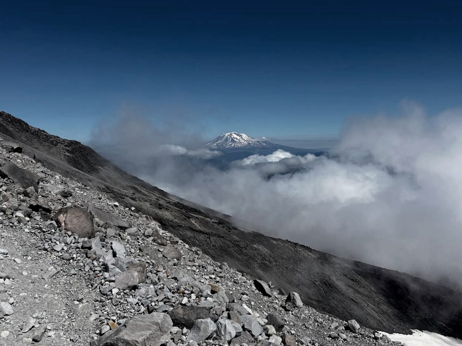 Mt. Adams seen from Mt. St. Helens during the day, volcanic devastation in foreground